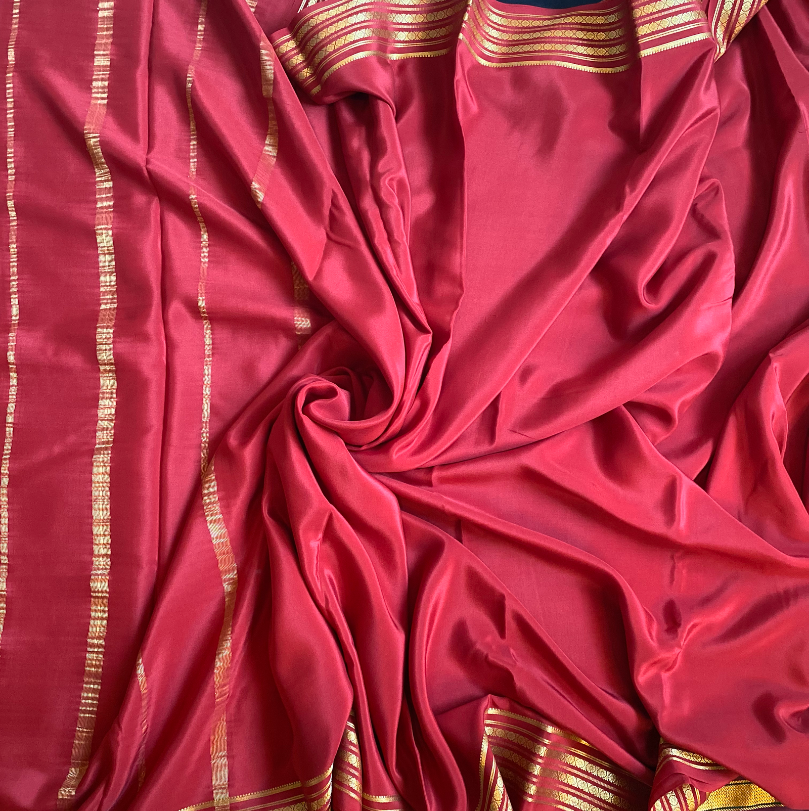 Mysore crepe silk Brick Red colour with Golden Rudraksha borders